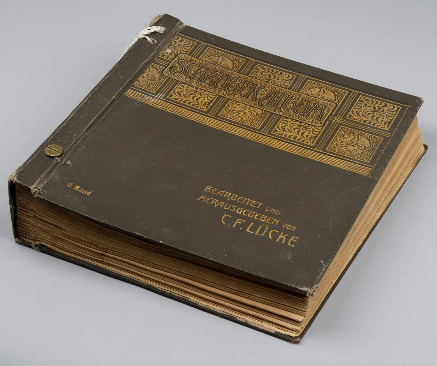 Иллюстрированный альбом для марок фирмы «Шаубек». Т. II (Африка, Америка). 1900-е годы.