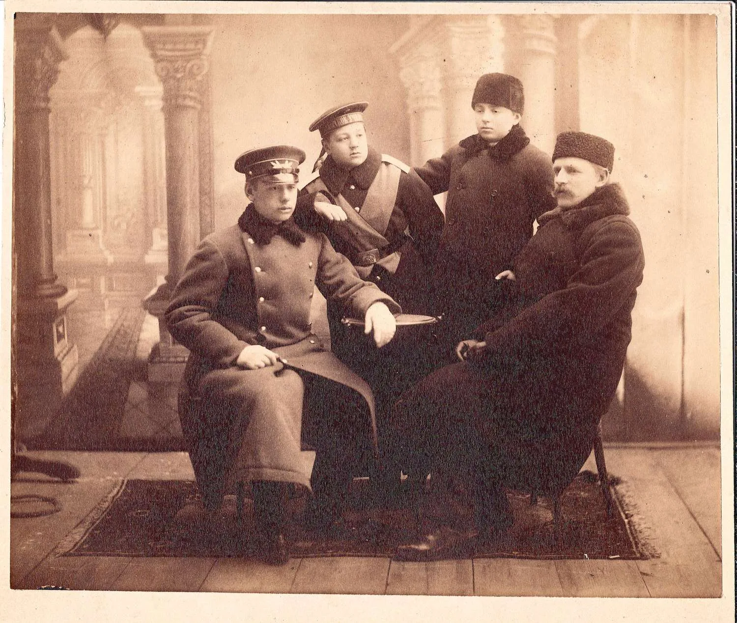 Групповая постановочная фотография «Семья воспитанника Морского училища». Россия, 1880-е - начало 1890-х годов.